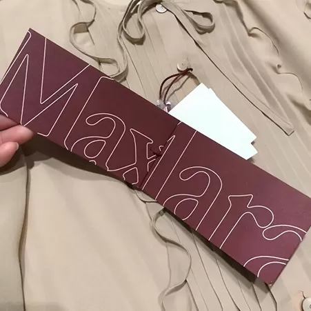 Etichette per abbigliamento e accessori di lusso